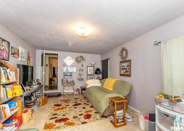 living room with a textured ceiling