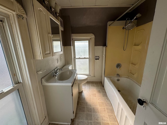 full bathroom featuring vanity, toilet, and shower / bathtub combination