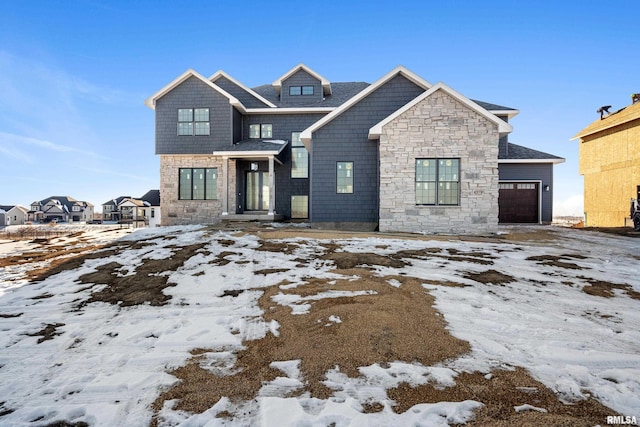 view of front of home featuring a garage and a residential view