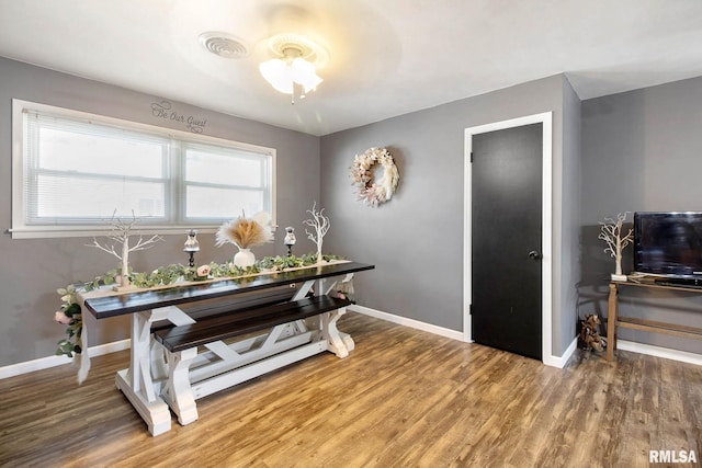 interior space with hardwood / wood-style floors