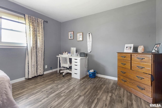 office with dark wood-type flooring