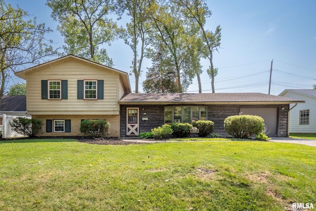 split level home with a garage and a front yard