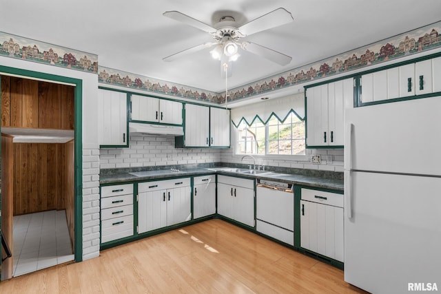 kitchen featuring light hardwood / wood-style flooring, white cabinets, white appliances, and ceiling fan