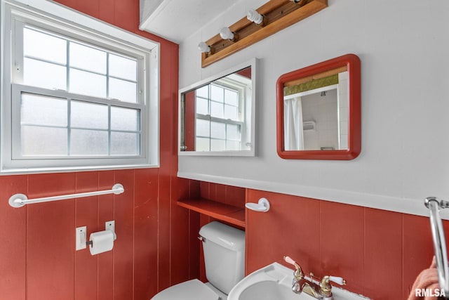 bathroom with toilet and sink