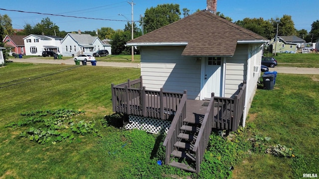 view of outdoor structure with a yard