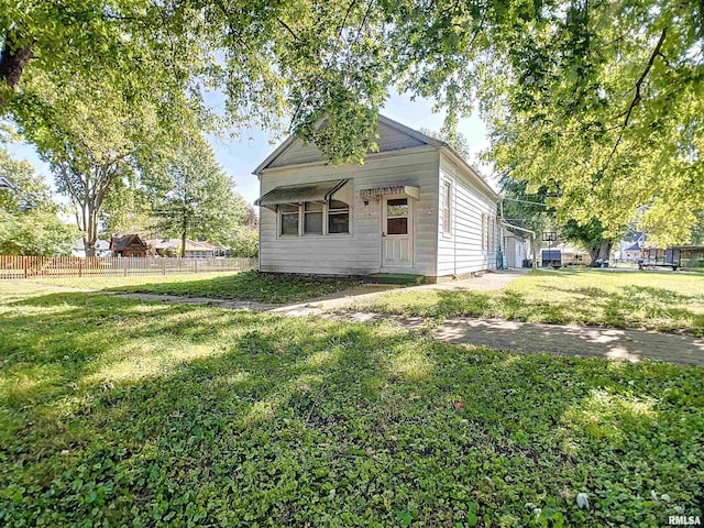 exterior space with a front yard