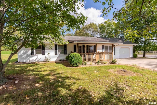 ranch-style house featuring a porch, a front lawn, and a garage