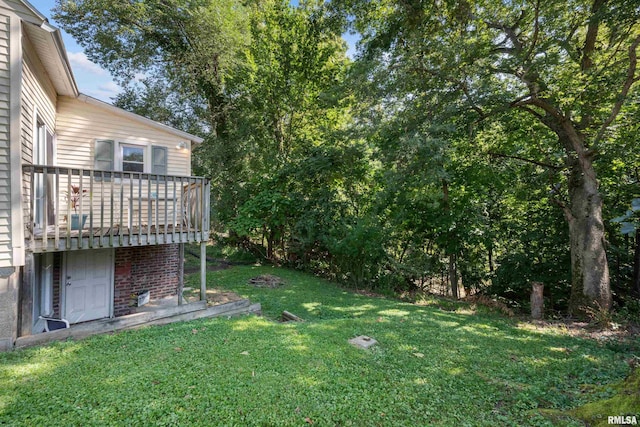 view of yard with a wooden deck