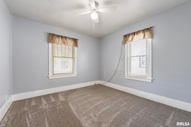 carpeted empty room with ceiling fan