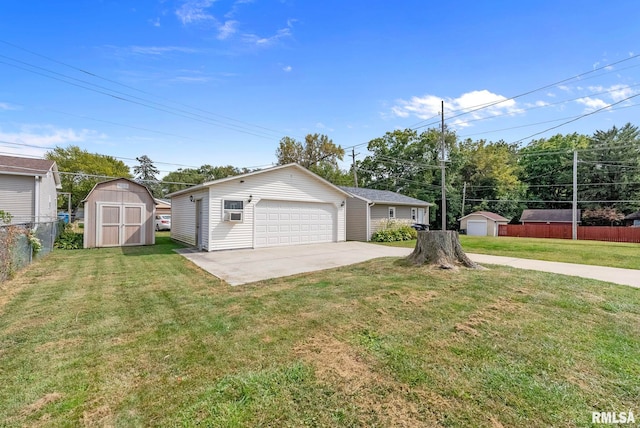 garage with a lawn