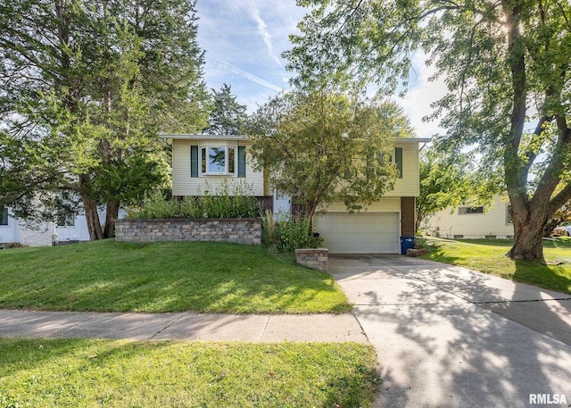 view of front of house with a garage and a front lawn