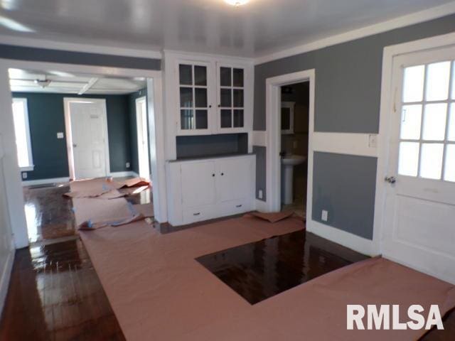 kitchen with sink and dark wood-type flooring