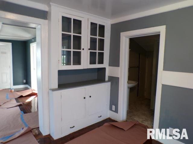 kitchen featuring white cabinets