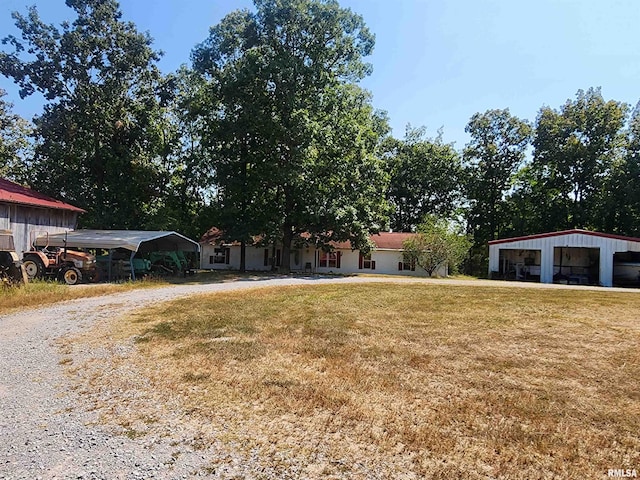 view of yard featuring a carport