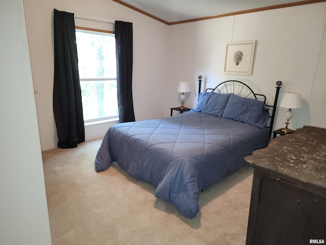 carpeted bedroom featuring lofted ceiling and crown molding