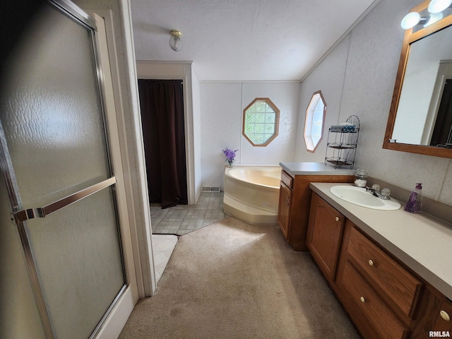 bathroom with vanity, a textured ceiling, crown molding, shower with separate bathtub, and tile patterned floors