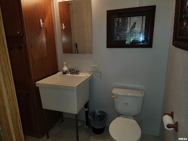 bathroom featuring toilet