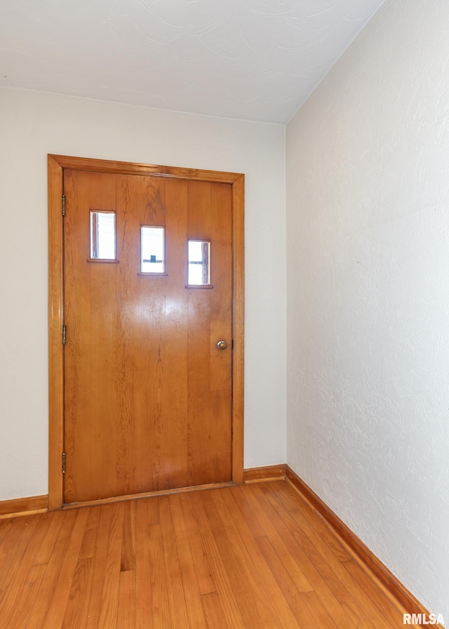 interior space with light hardwood / wood-style flooring