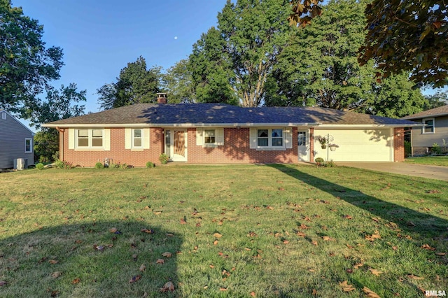 ranch-style home featuring a garage, central air condition unit, and a front lawn