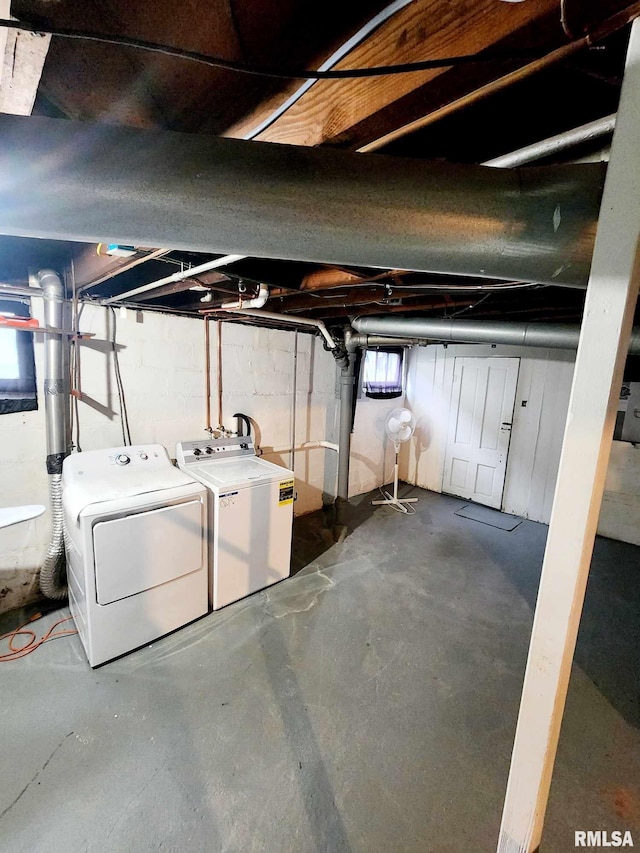 basement featuring washing machine and dryer