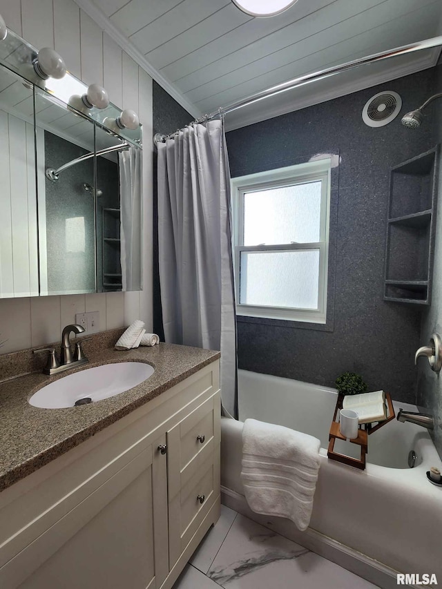 bathroom featuring shower / bath combo with shower curtain, vanity, and crown molding