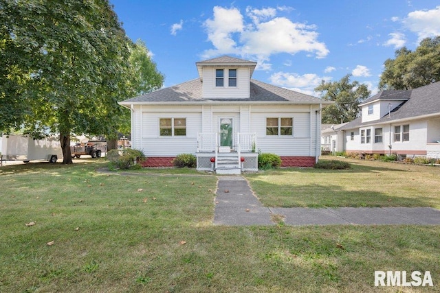 view of front of property with a front yard