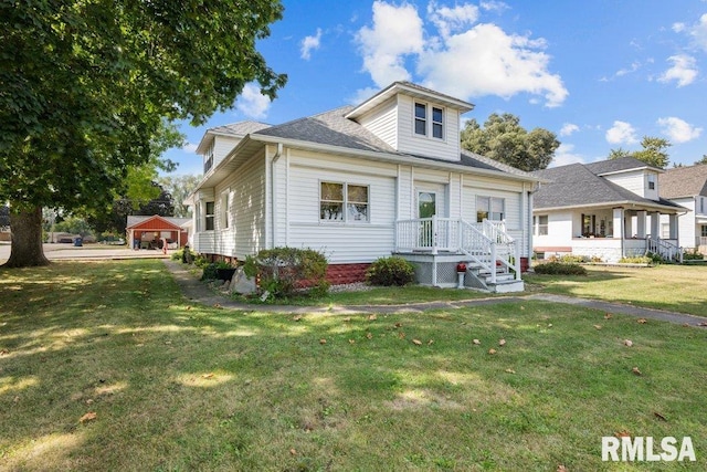 view of front of house with a porch and a front yard