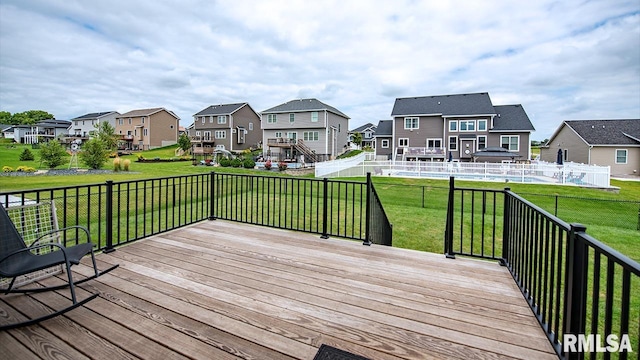 deck featuring a lawn