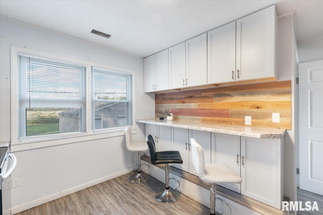 office space featuring light hardwood / wood-style floors