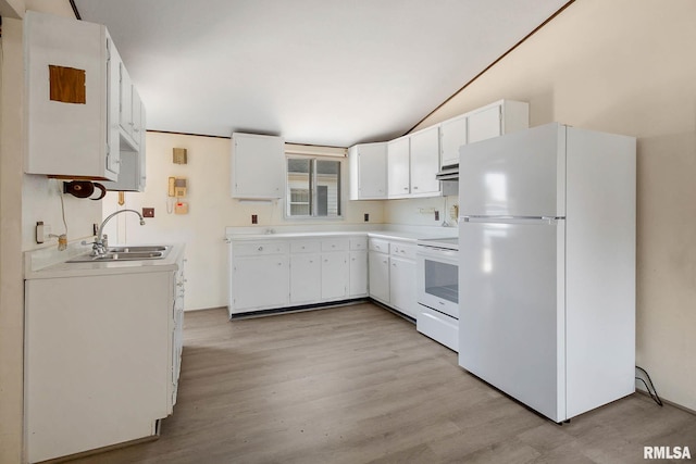 kitchen featuring white cabinets, light hardwood / wood-style flooring, sink, and white appliances