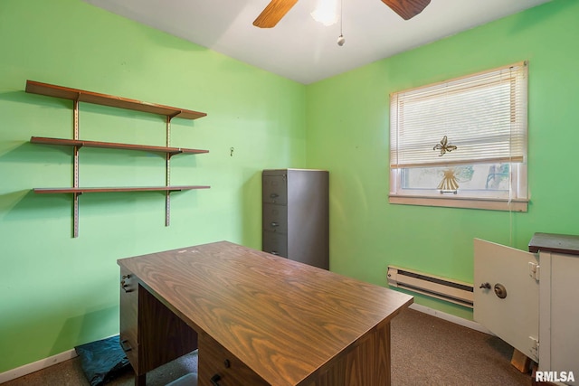 carpeted office space featuring a baseboard heating unit and ceiling fan