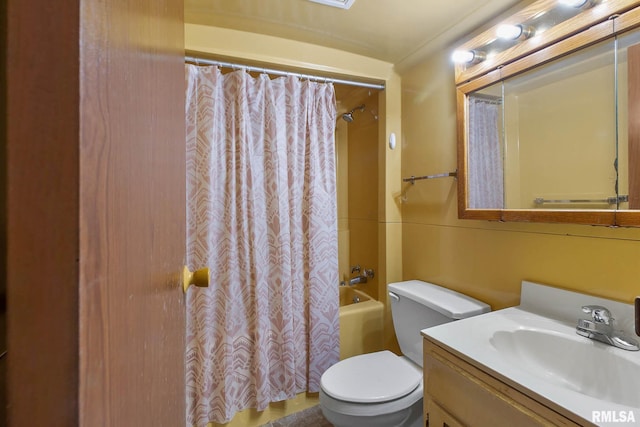 full bathroom with shower / tub combo with curtain, vanity, and toilet