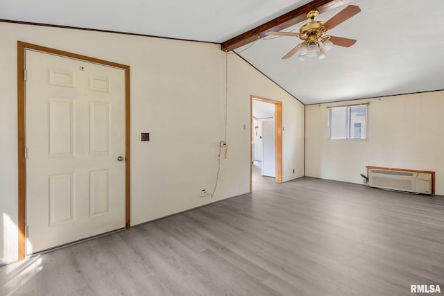 empty room with lofted ceiling with beams, ceiling fan, light hardwood / wood-style flooring, and a wall mounted AC