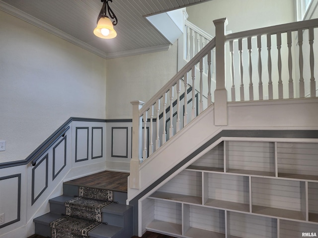 stairway with crown molding