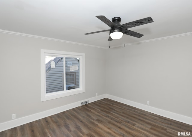 unfurnished room featuring dark hardwood / wood-style floors, ceiling fan, and ornamental molding