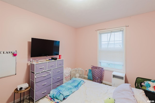 bedroom featuring carpet