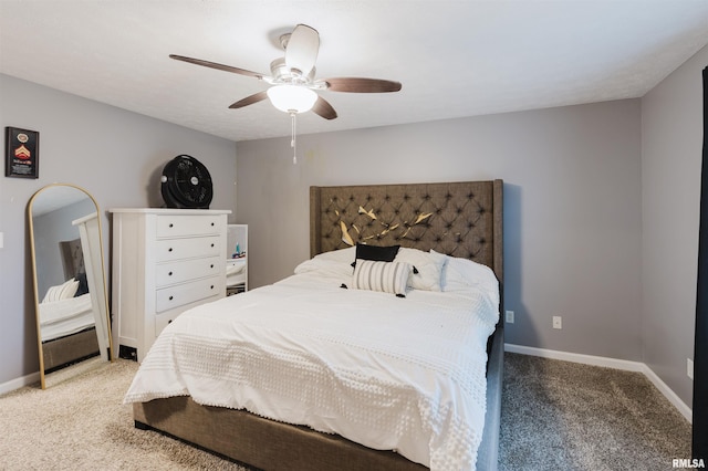 bedroom with ceiling fan and carpet flooring