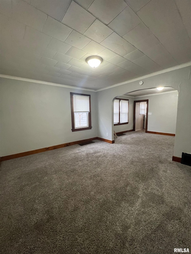 carpeted empty room with ornamental molding