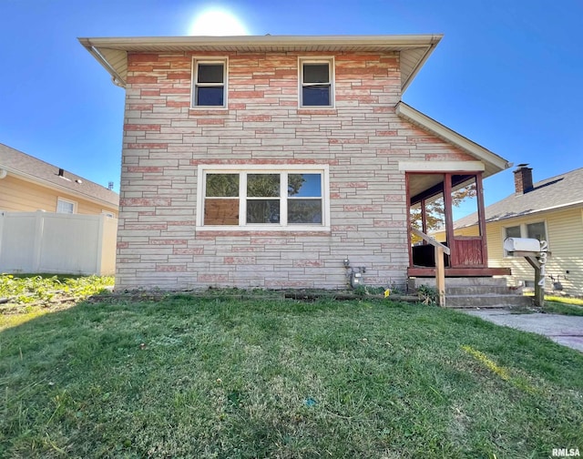 view of front of home with a front yard