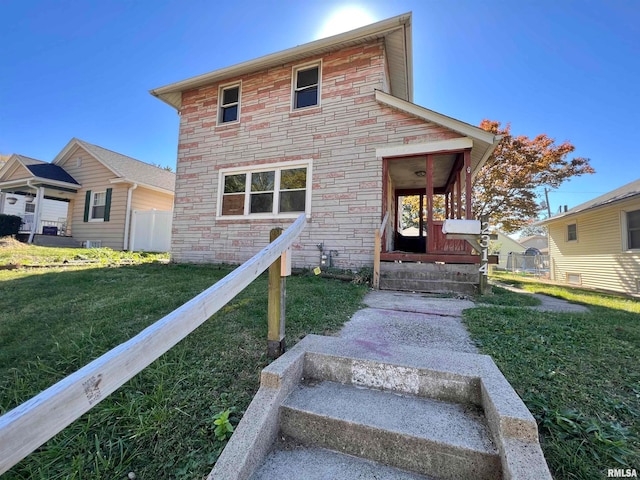 view of front of house with a front lawn