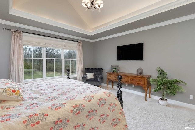 carpeted bedroom featuring crown molding, a chandelier, and a tray ceiling