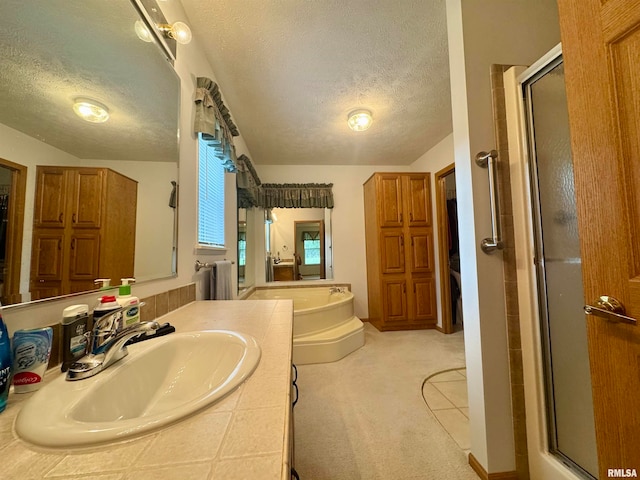 bathroom featuring a textured ceiling, independent shower and bath, and vaulted ceiling