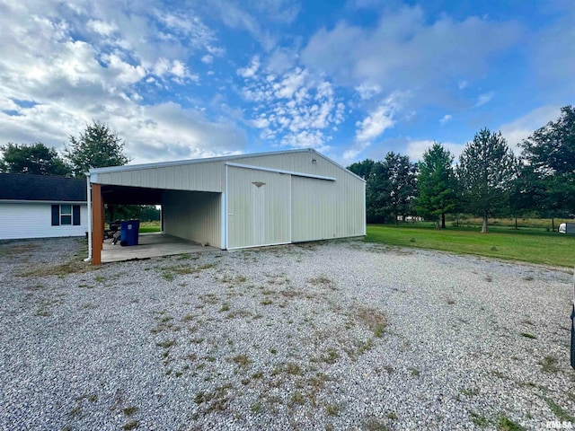 view of outdoor structure with a yard