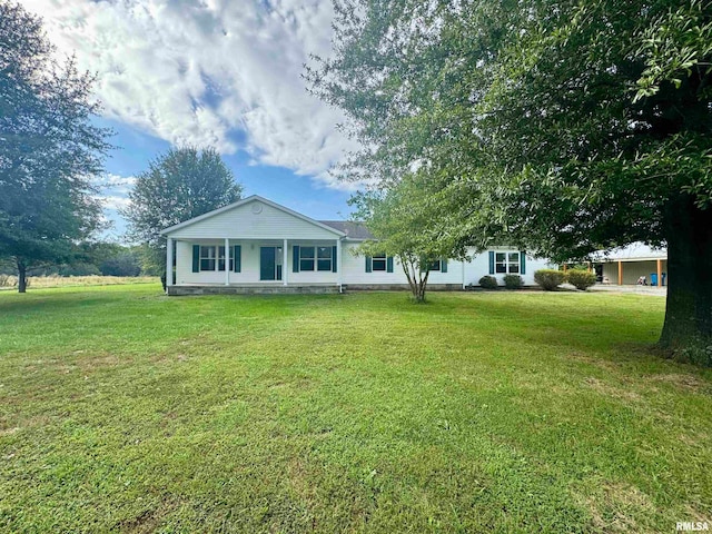 ranch-style home with a front lawn