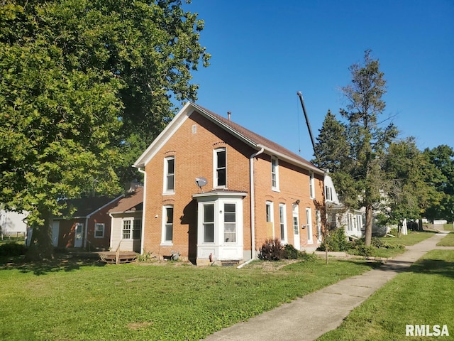 exterior space with a front lawn