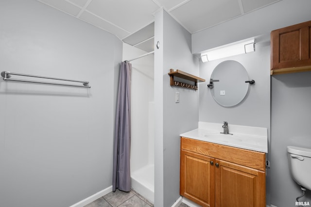 bathroom with vanity, tile patterned flooring, toilet, and a shower with shower curtain