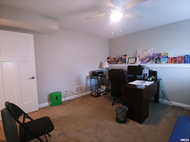 carpeted home office with ceiling fan