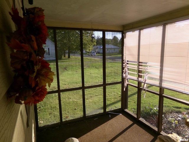 sunroom / solarium featuring plenty of natural light