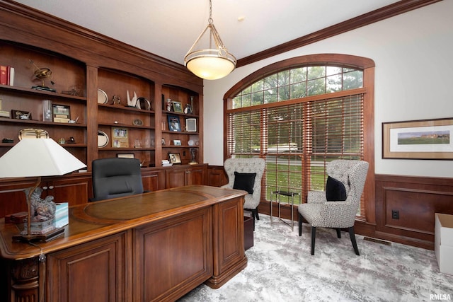 office with crown molding and light carpet