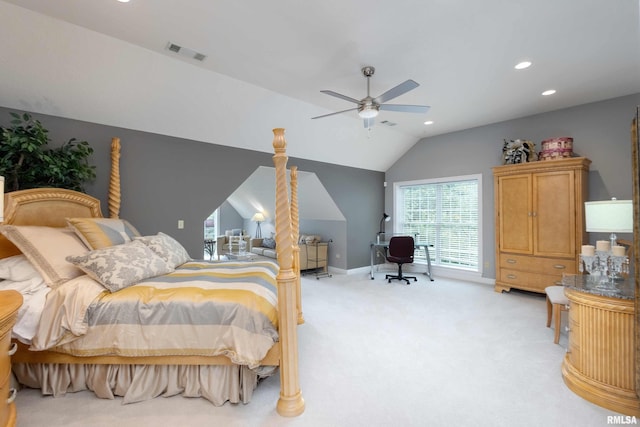 bedroom featuring ceiling fan, light carpet, and vaulted ceiling